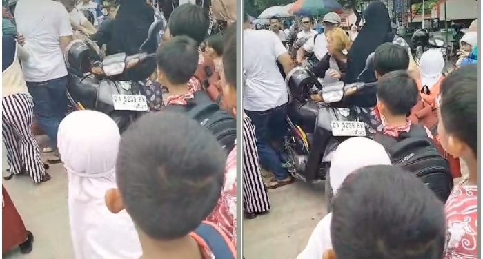 Heboh! Diduga Cemburu, Seorang Wanita Amuki Istri Mantan Suami di Tengah Jalan Raya di Tabalong